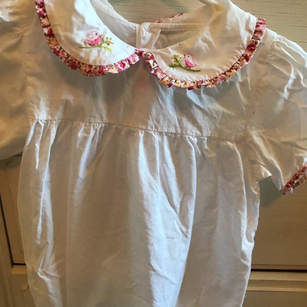 Collared baby bubble in white.